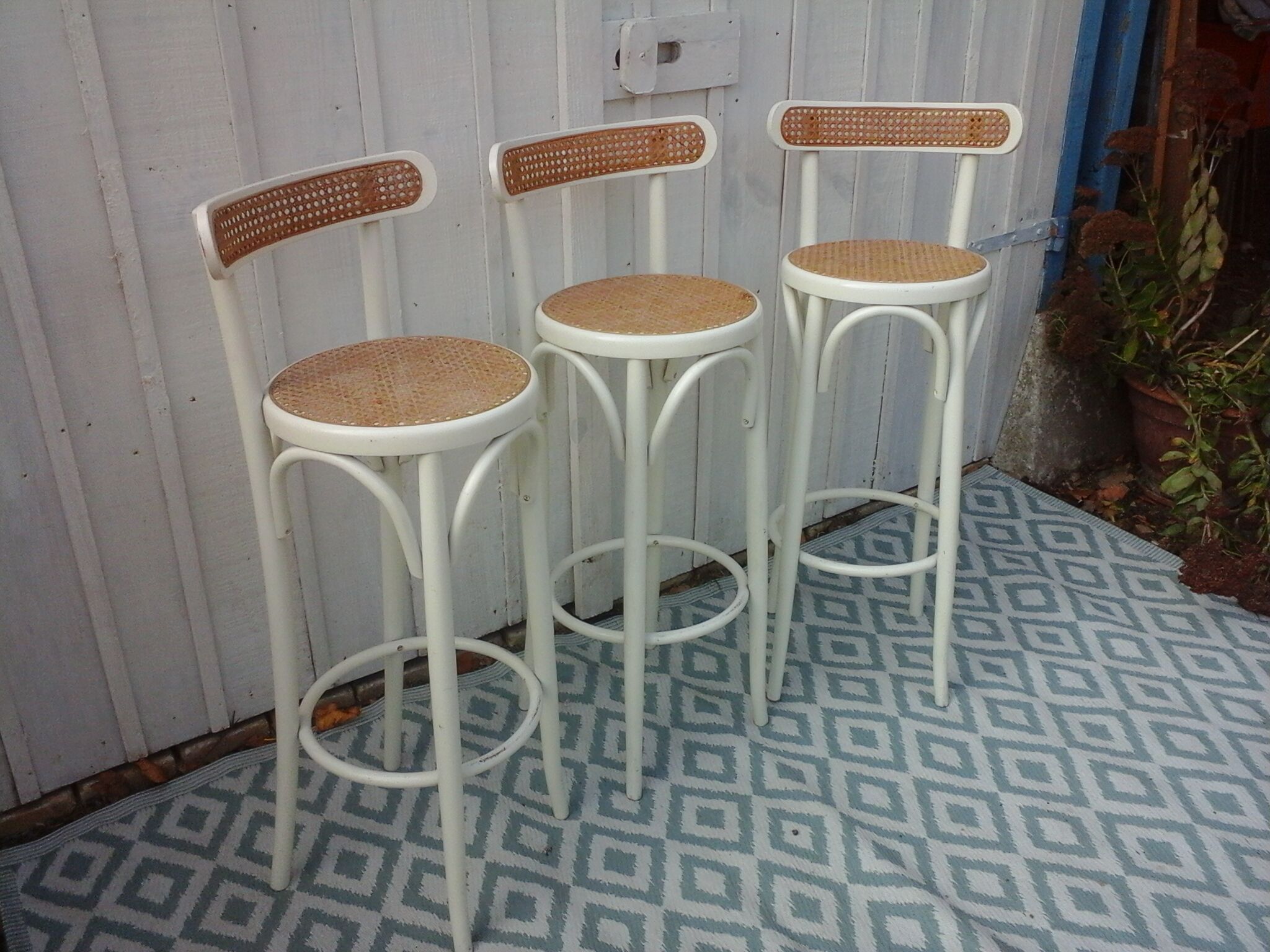 3 high bar cane chairs