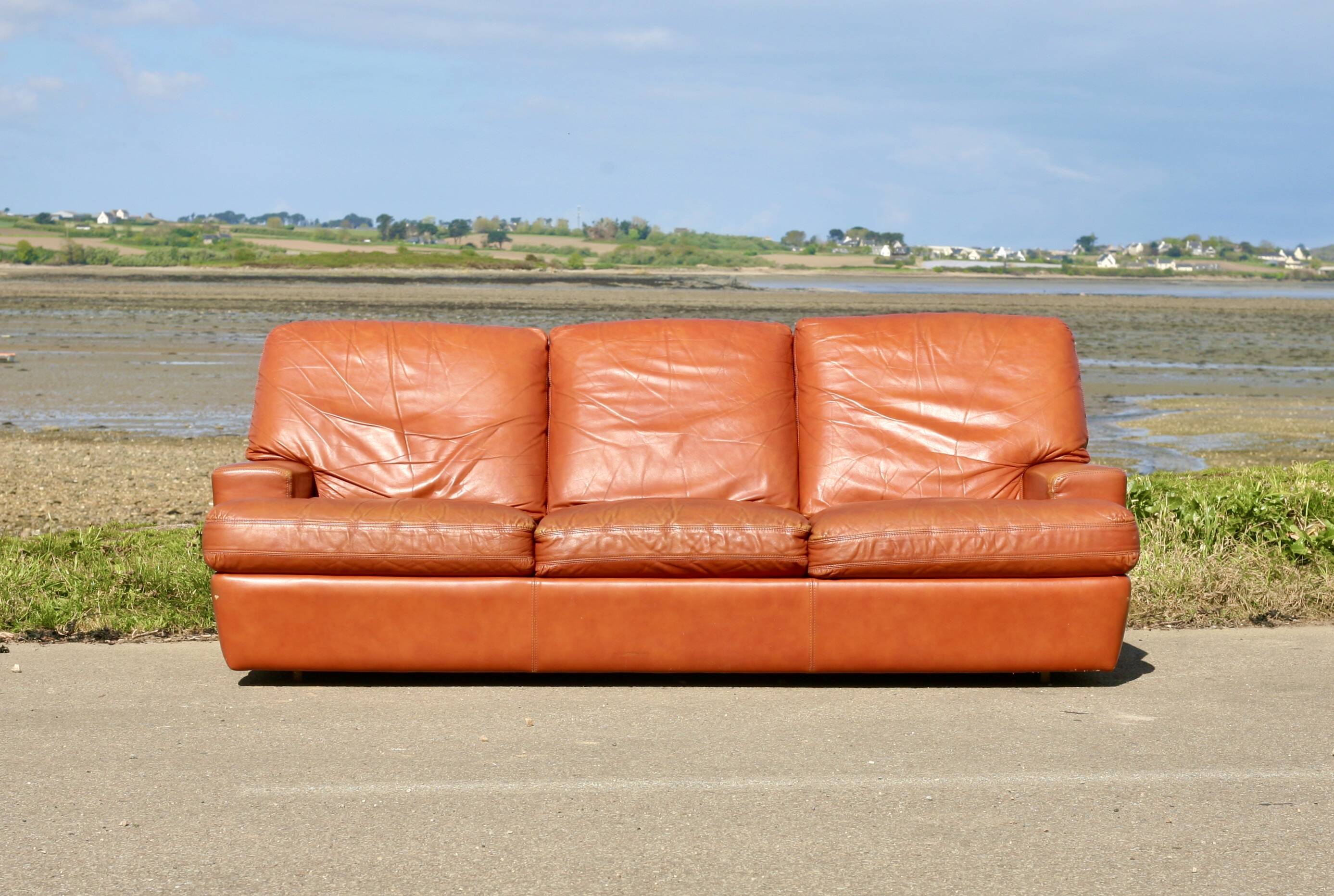 Space age sofa. Tan leather. Circa 1970