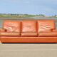 Space age sofa. Tan leather. Circa 1970