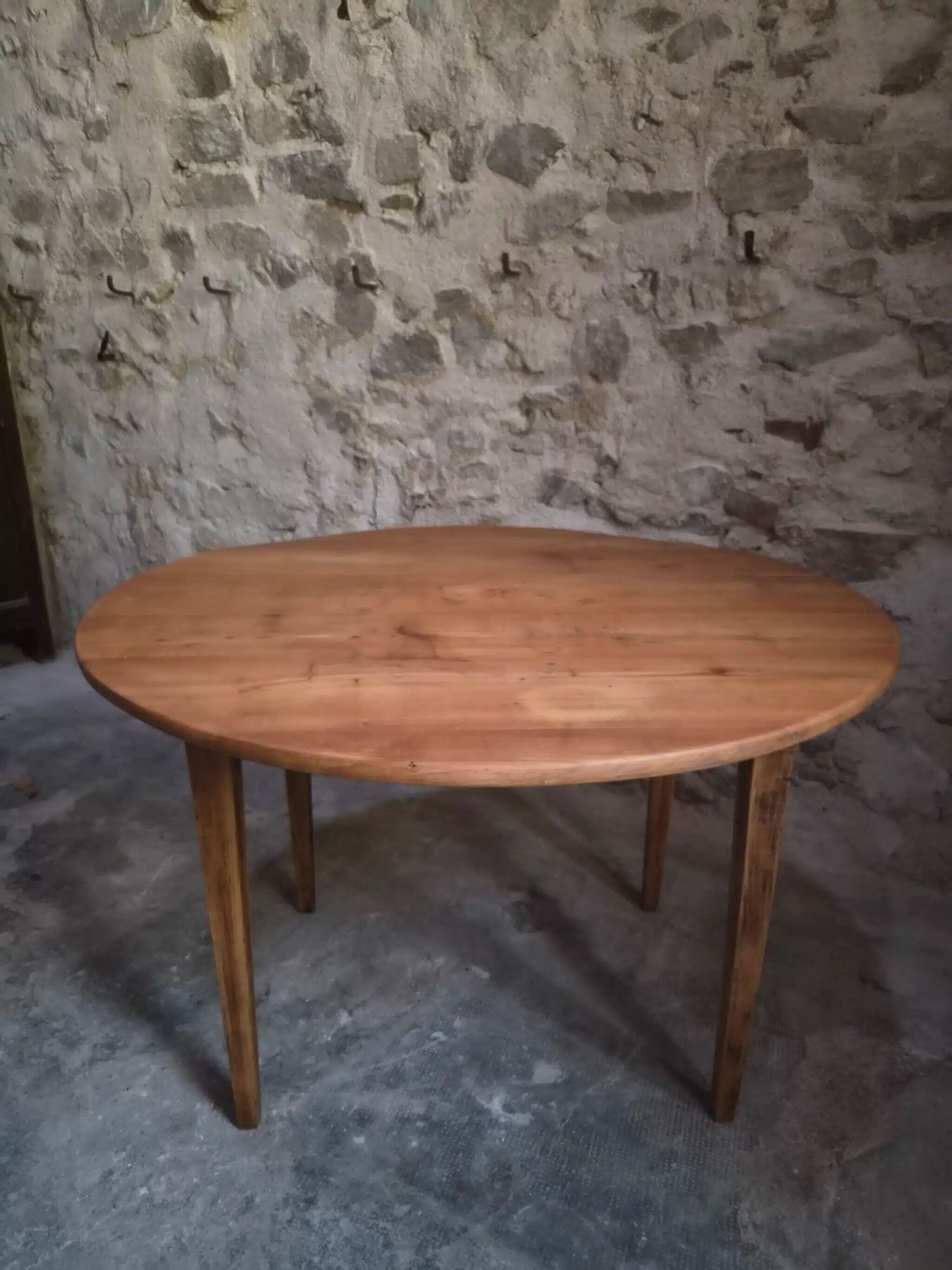 Rustic French antique dining table, drop-leaf table in cherry wood, circa 1900.