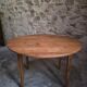 Rustic French antique dining table, drop-leaf table in cherry wood, circa 1900.