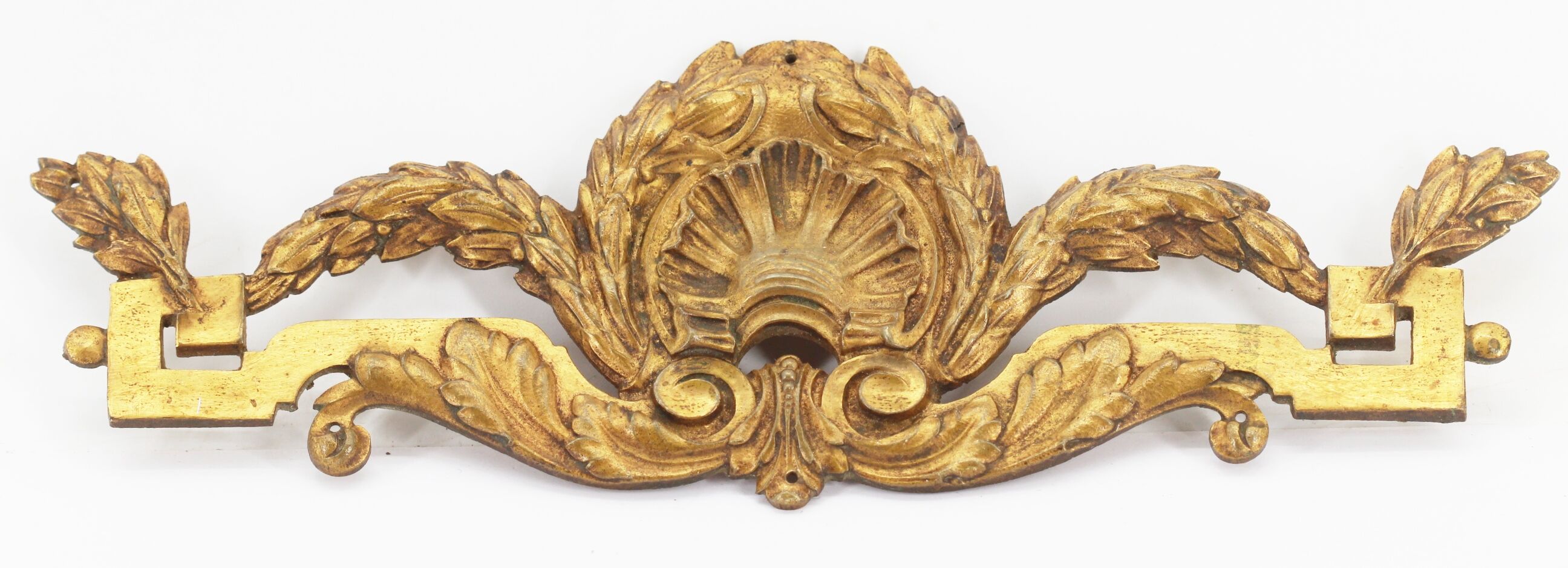 Old brass pediment