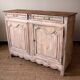 Buffet patiné et sculpté