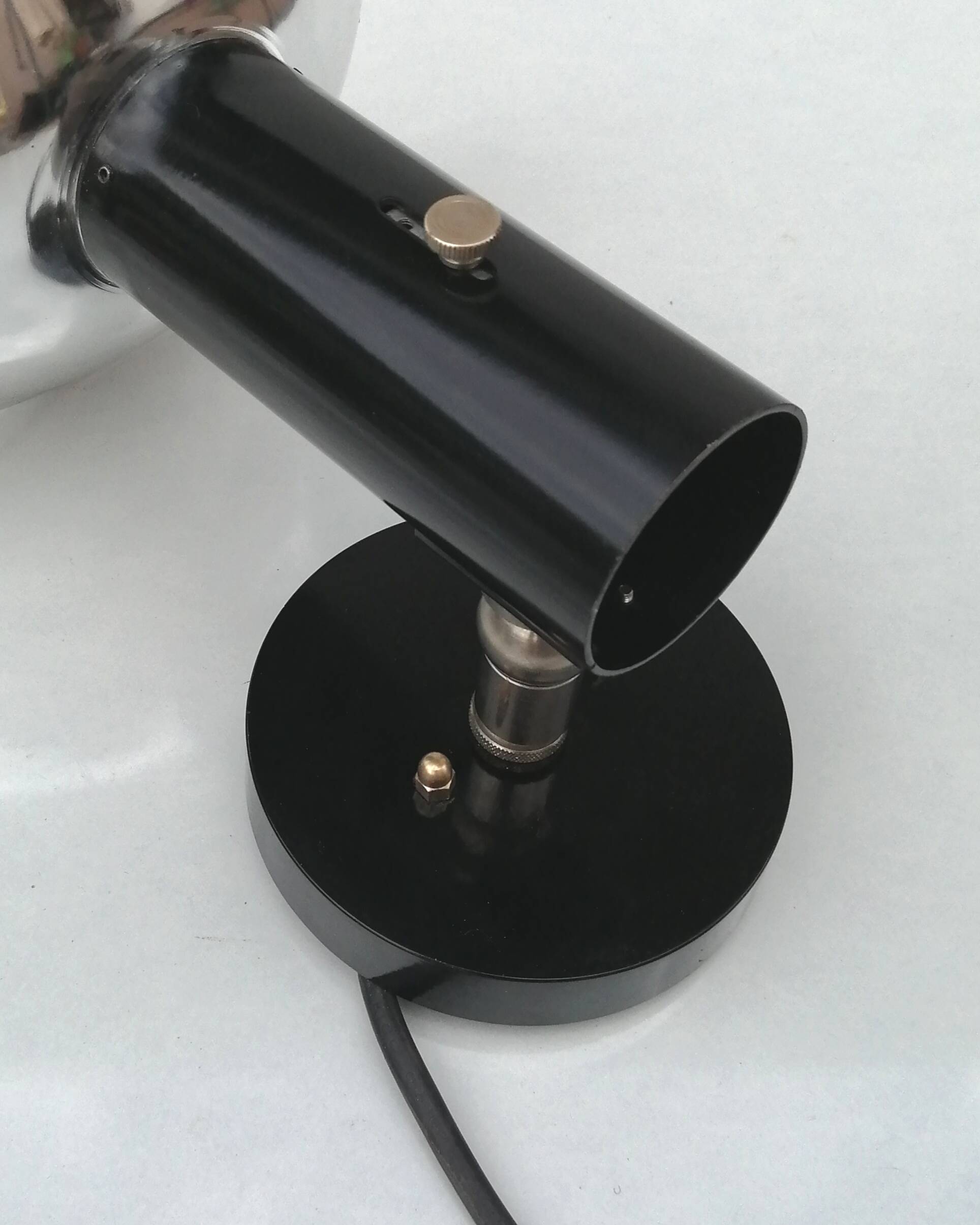 Adjustable black and chrome wall light from Raak, vintage 1960.