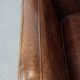 Dark brown design armchair made of sheepskin leather