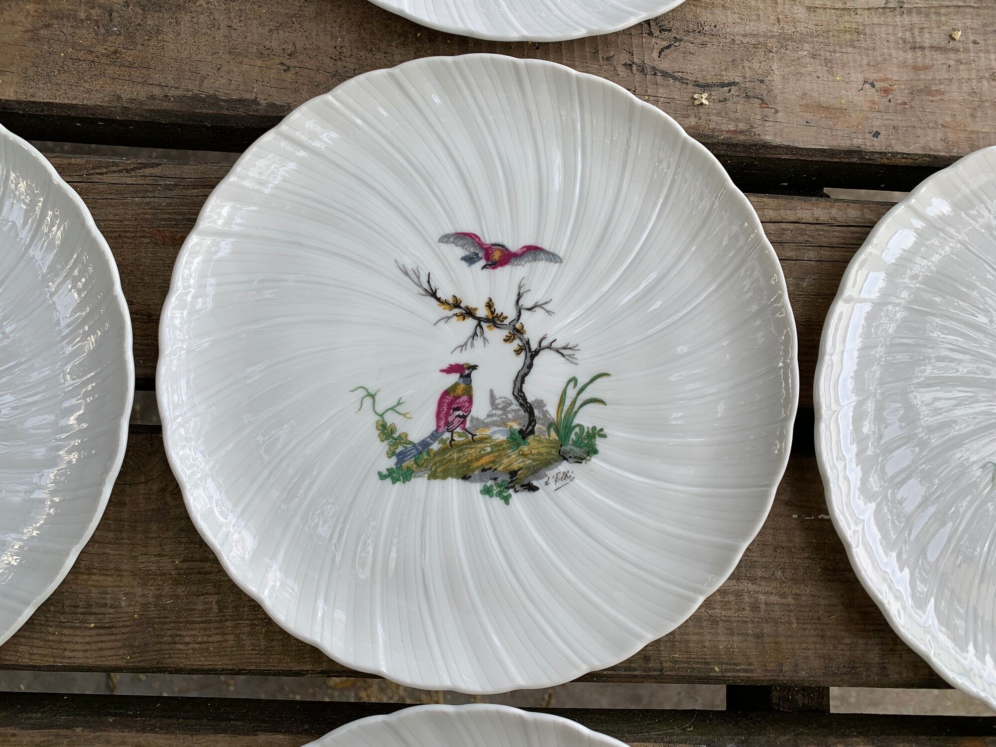 8 Bernardaud and Co. dessert plates signed Elbé, Limoges porcelain, decorated with birds