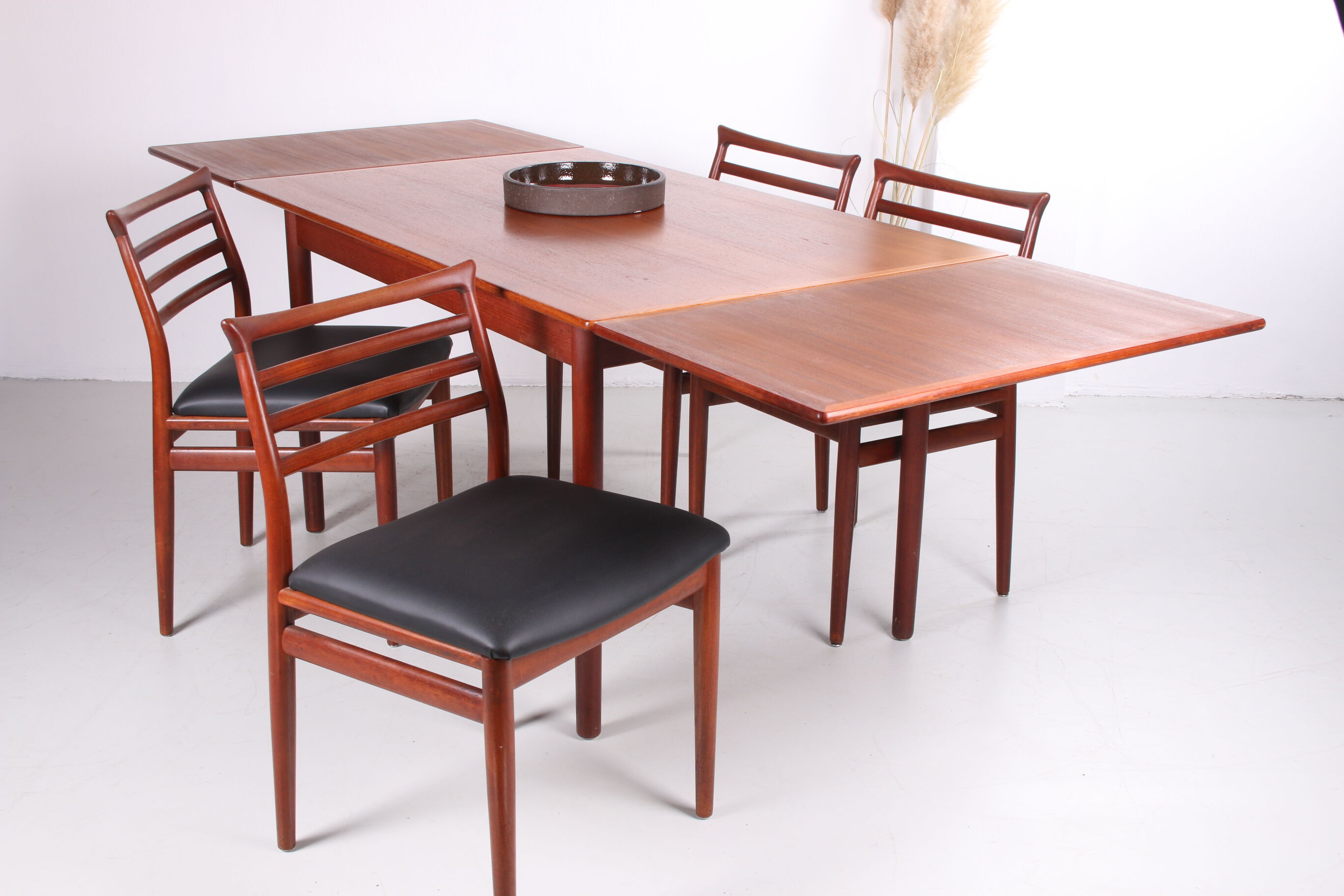 Danish teak draw-leaf dining table