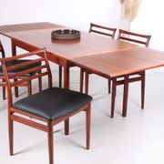 Danish teak draw-leaf dining table