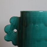 Handmade ceramic abstract vase with large handles and turquoise blue flowers