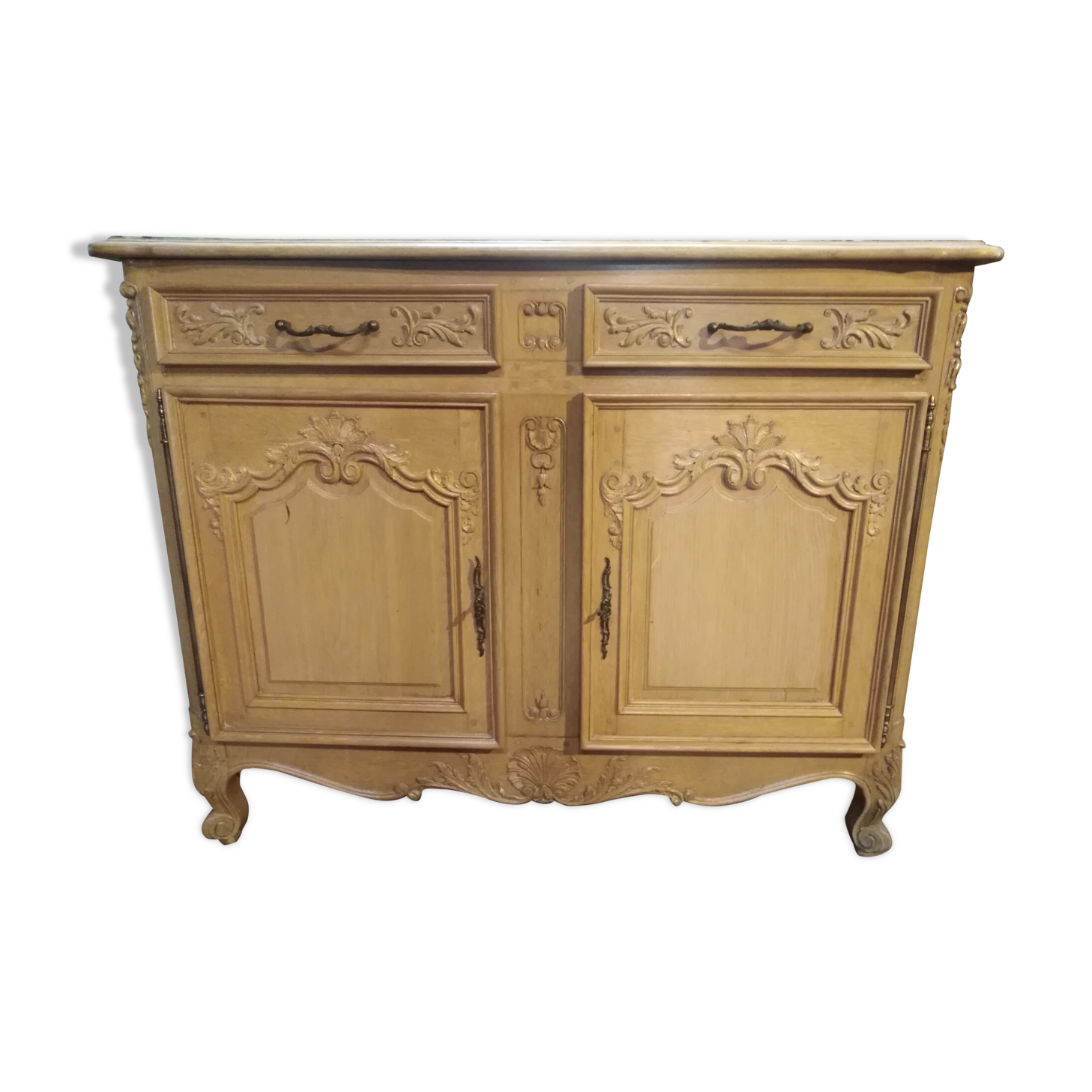 Curved buffet, sculpted Provençal style