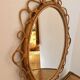 French circular sun-shaped mirror in rattan with knots, 1950s.