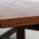 Square extendable dining table by Silvio Coppola for Bernini
