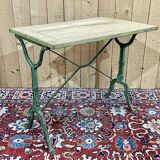 Bistro table from the beginning of the 20th century, oak top and cast iron base