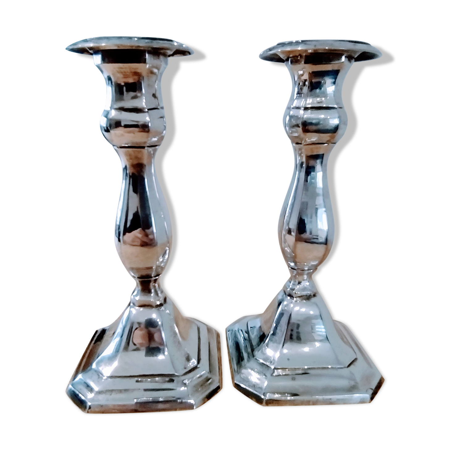 Pair of silver metal candle holders
