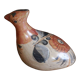 Ancient Mexican bird statue in ceramic