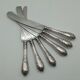 Six table knives