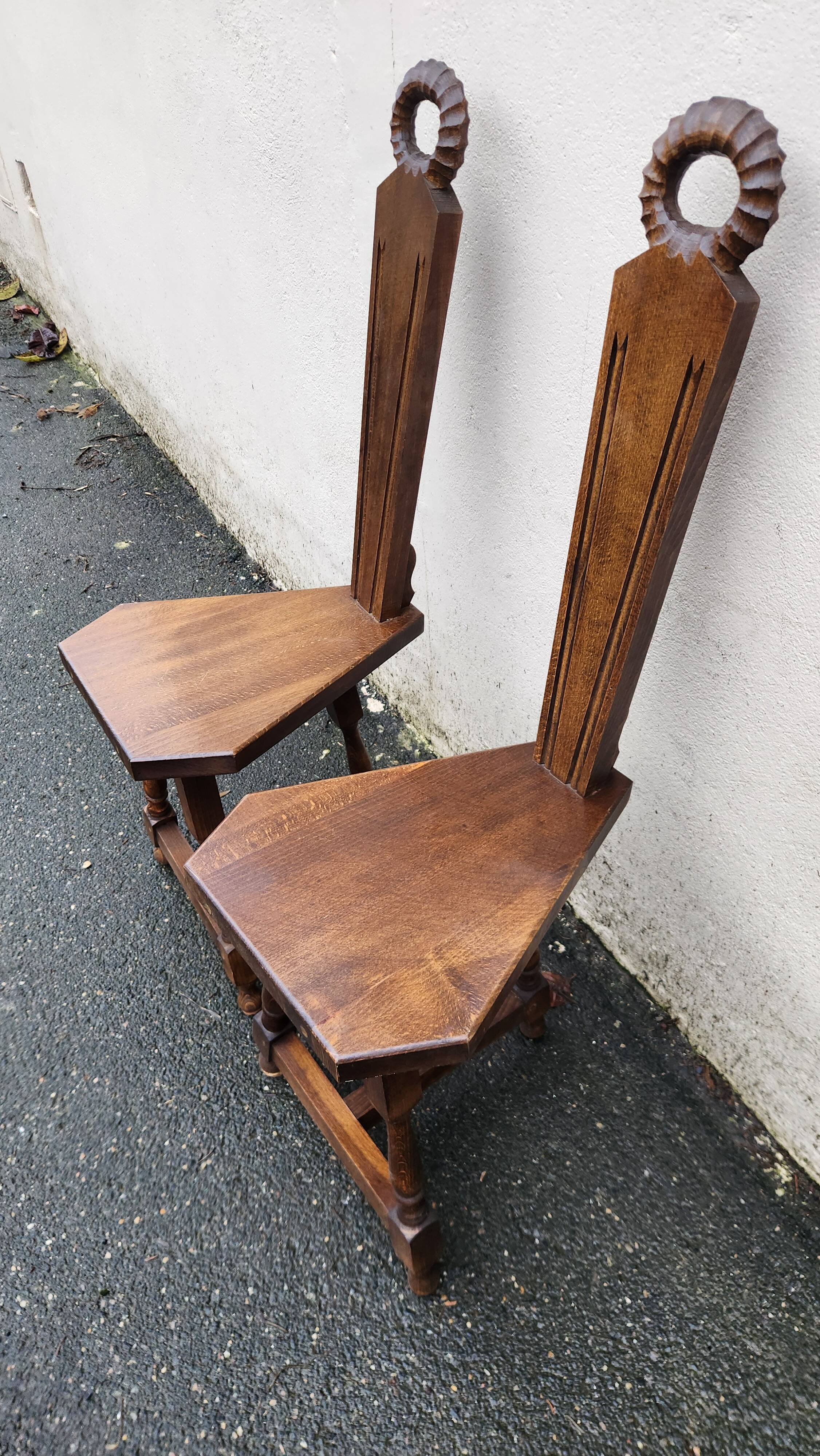 2 three-legged chairs made of solid wood