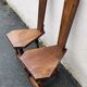 2 three-legged chairs made of solid wood