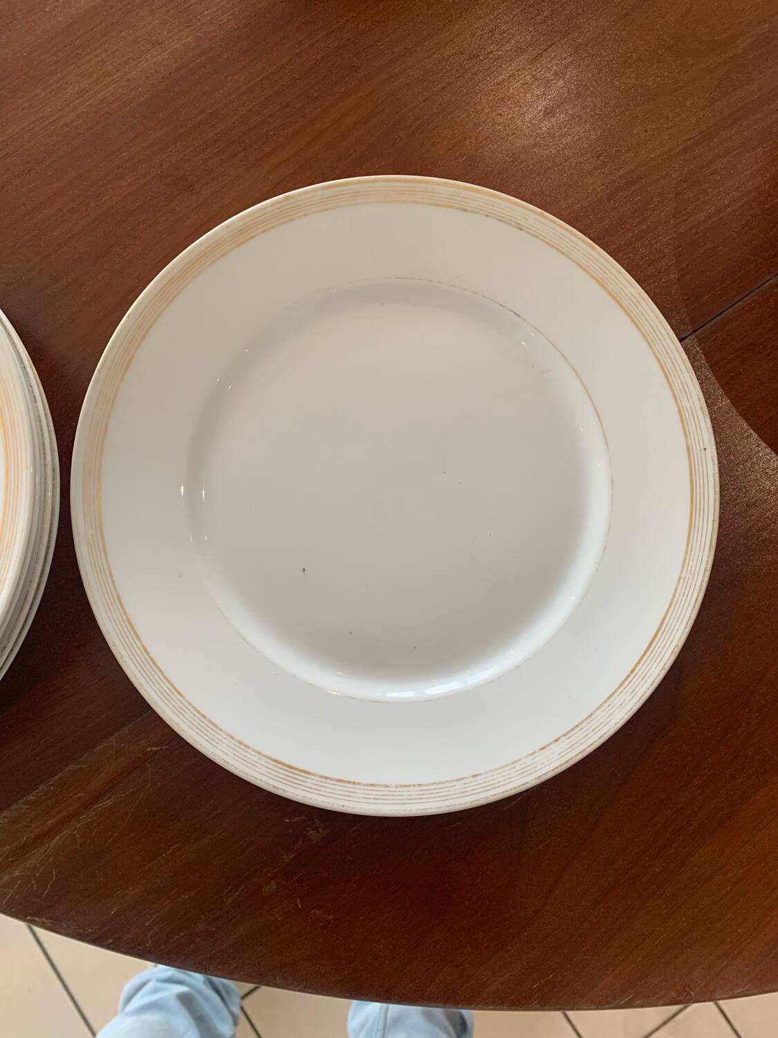 Lot of six flat plates, crockery, old white, gilded