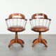Set of 2 swivel/office chairs with a cognac-coloured cow leather seat