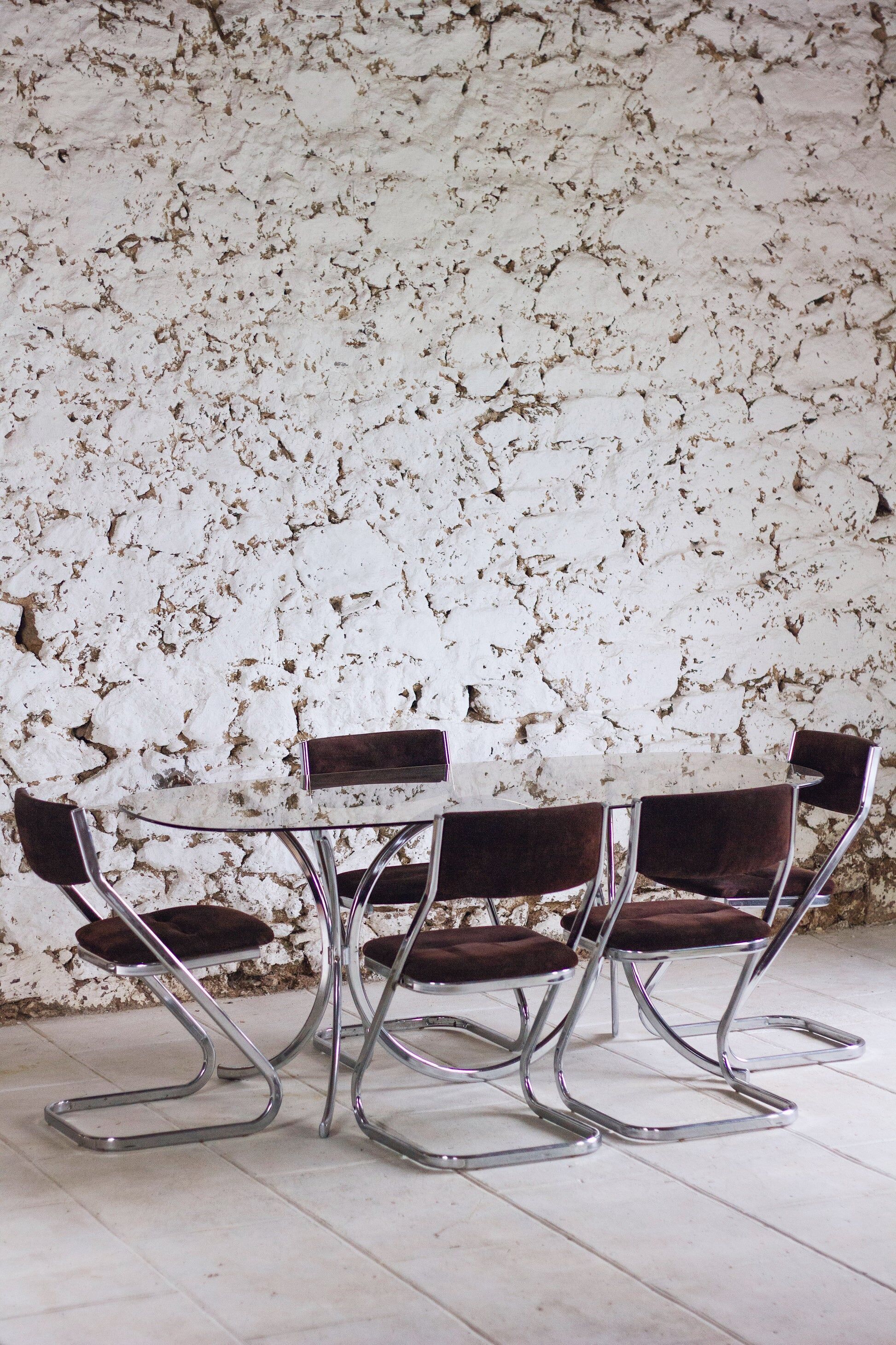 Chrome and smoked glass dining table in the style of Gastone Rinaldi, 1970.