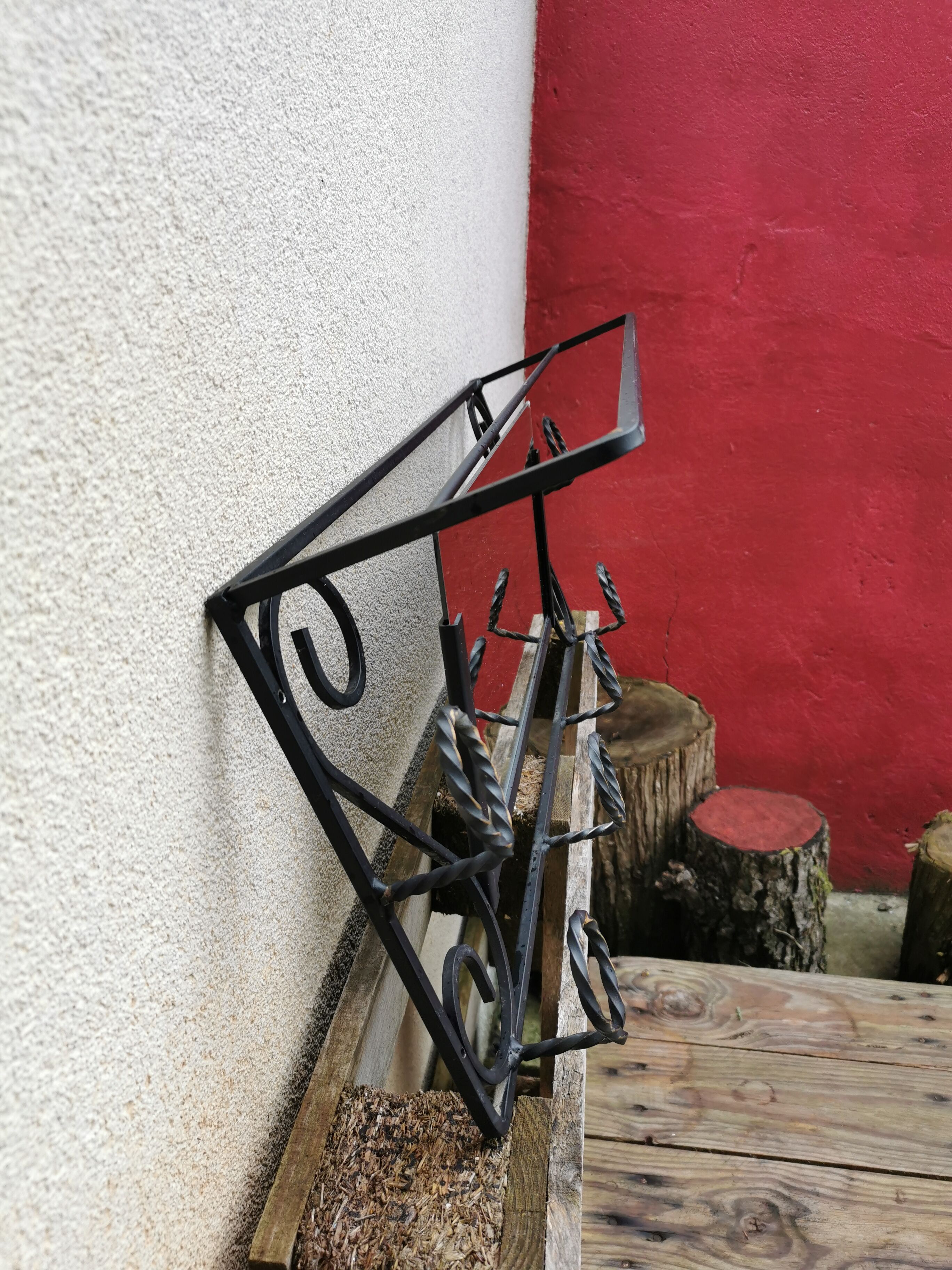 Vintage wrought iron coat rack