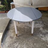 Table with extension cord that folds over the sides