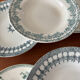 A deep plate in blue and green ironstone, antique French earthenware.