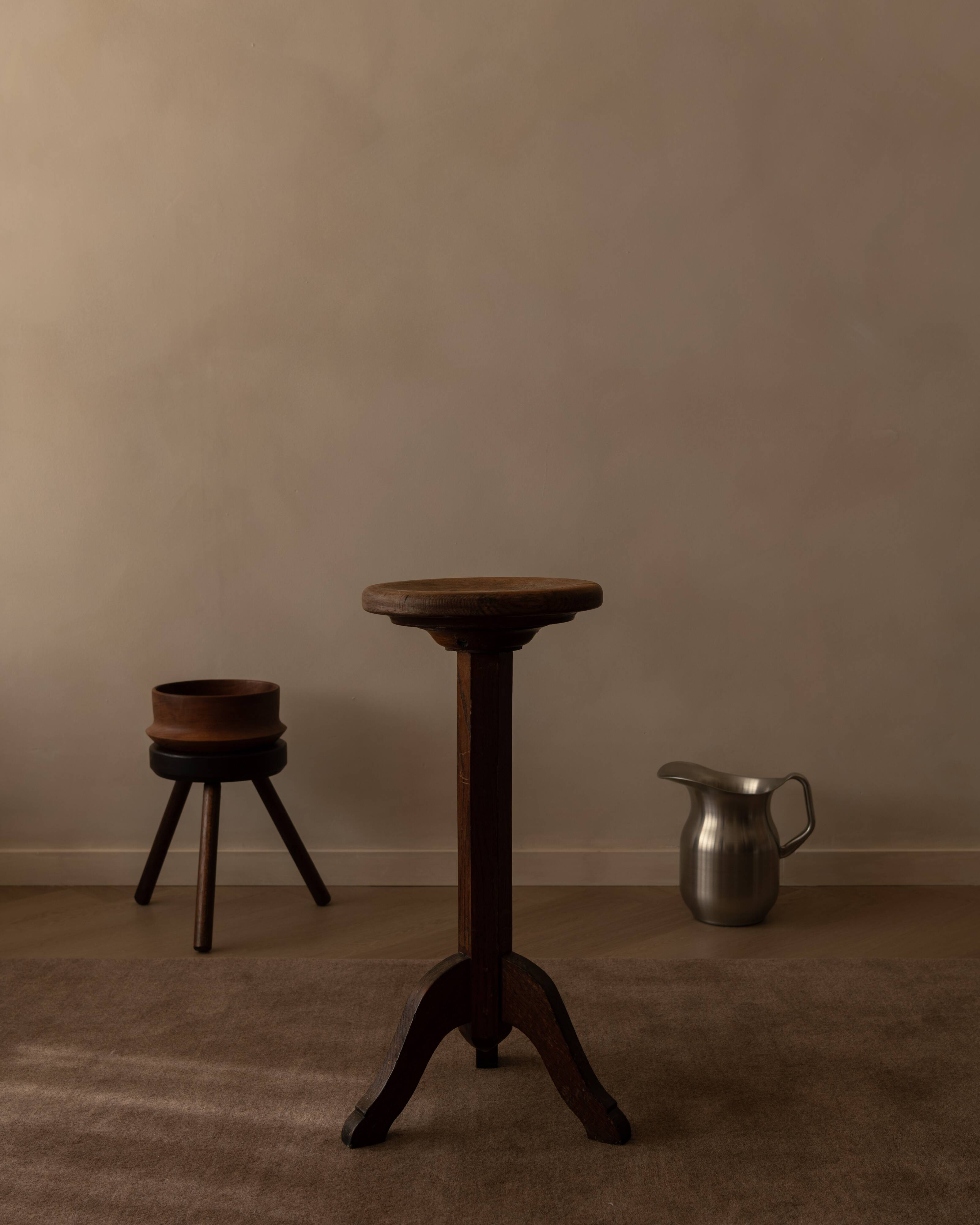 Vintage wooden pedestal plant stand