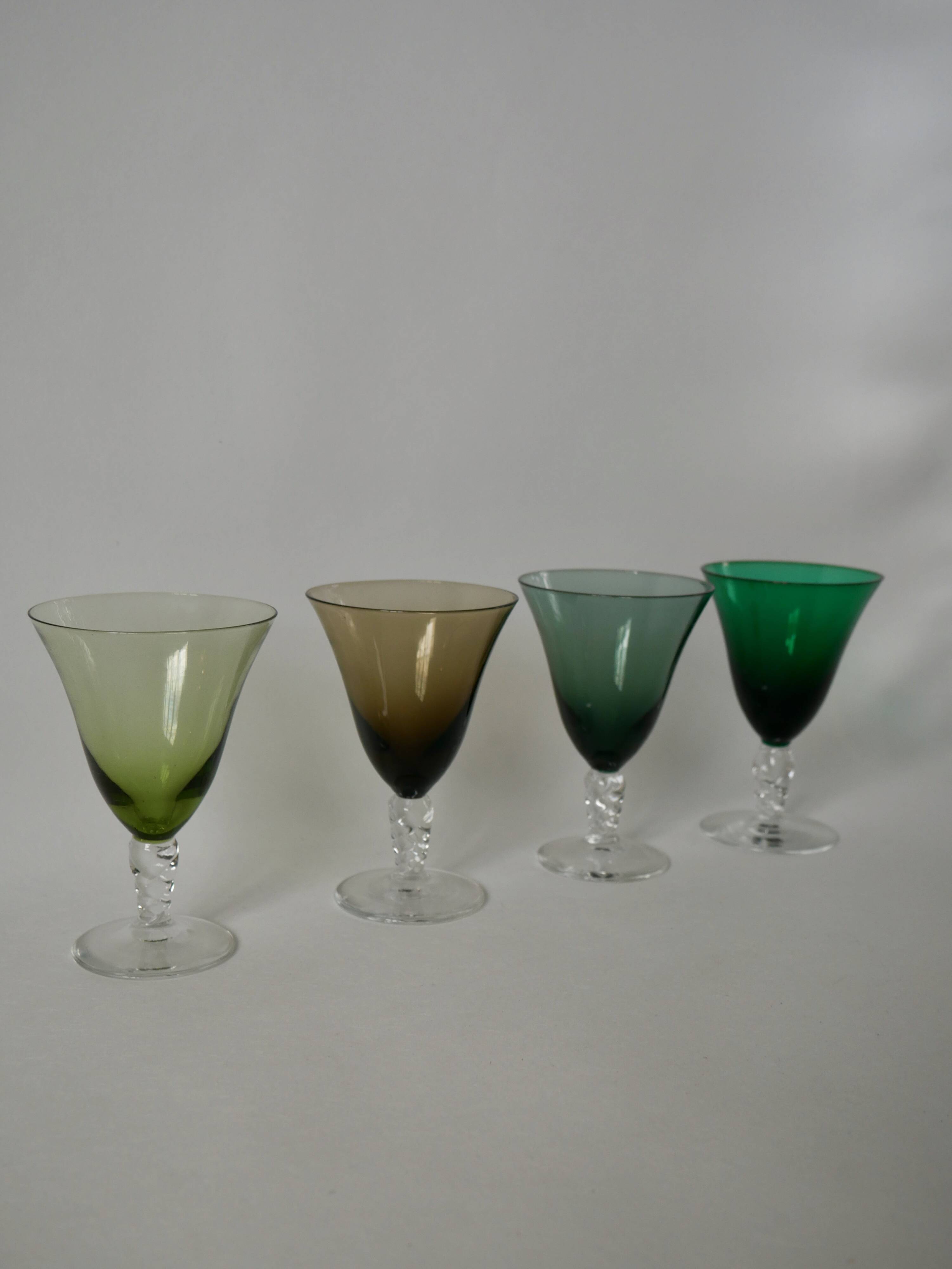 Set of 4 colored wine glasses with worked legs from the 50s