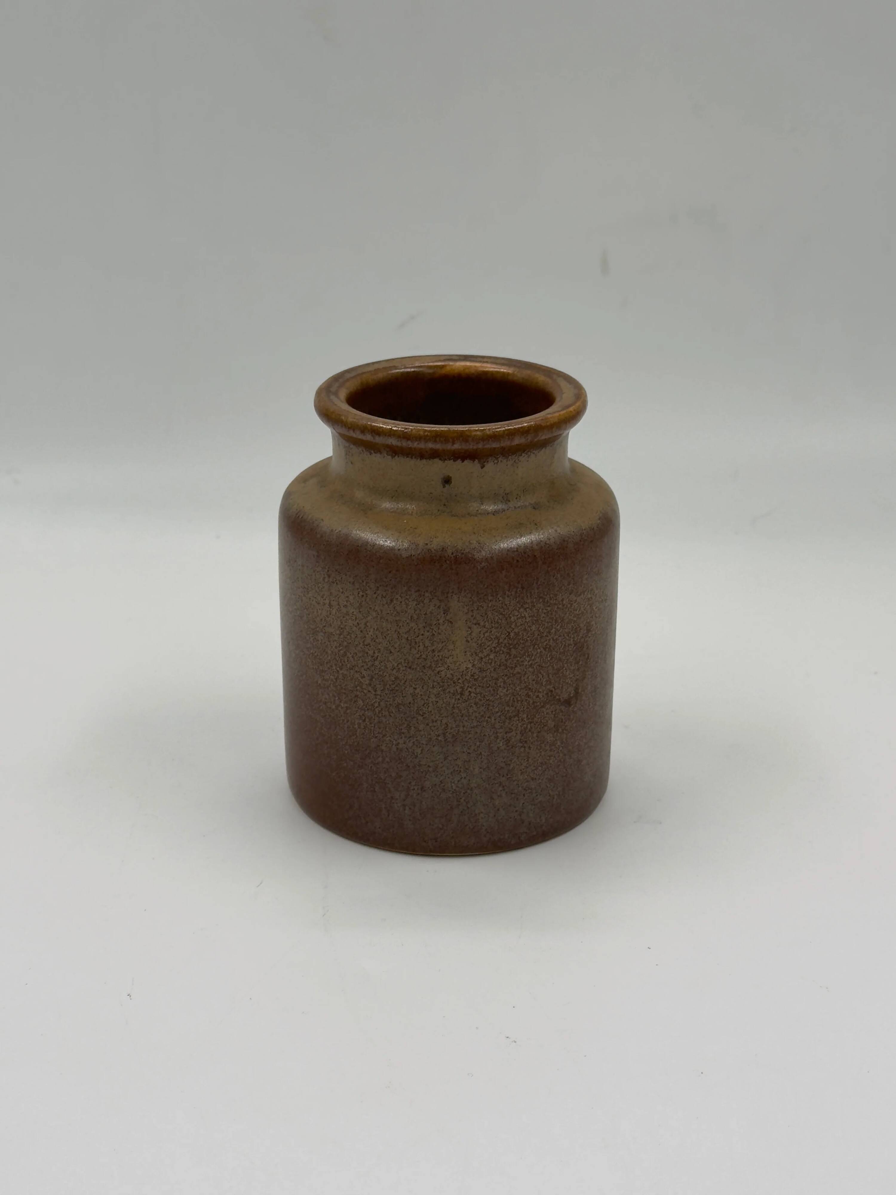 Vintage cylindrical ceramic workshop vase with speckled brown glaze.