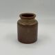 Vintage cylindrical ceramic workshop vase with speckled brown glaze.