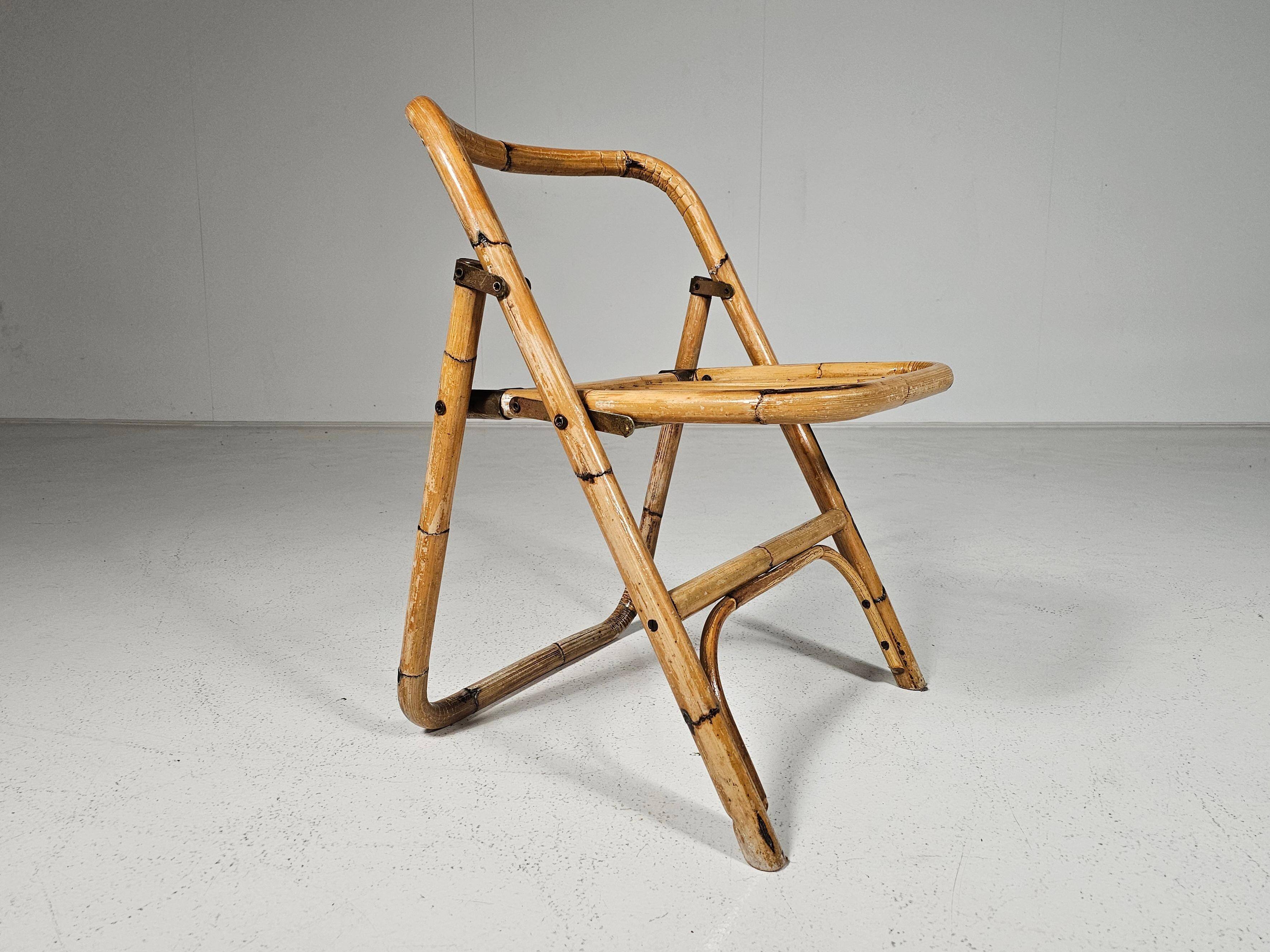 Set of 4 Dal Vera bamboo folding chairs, brass details, Italy, 1960s.