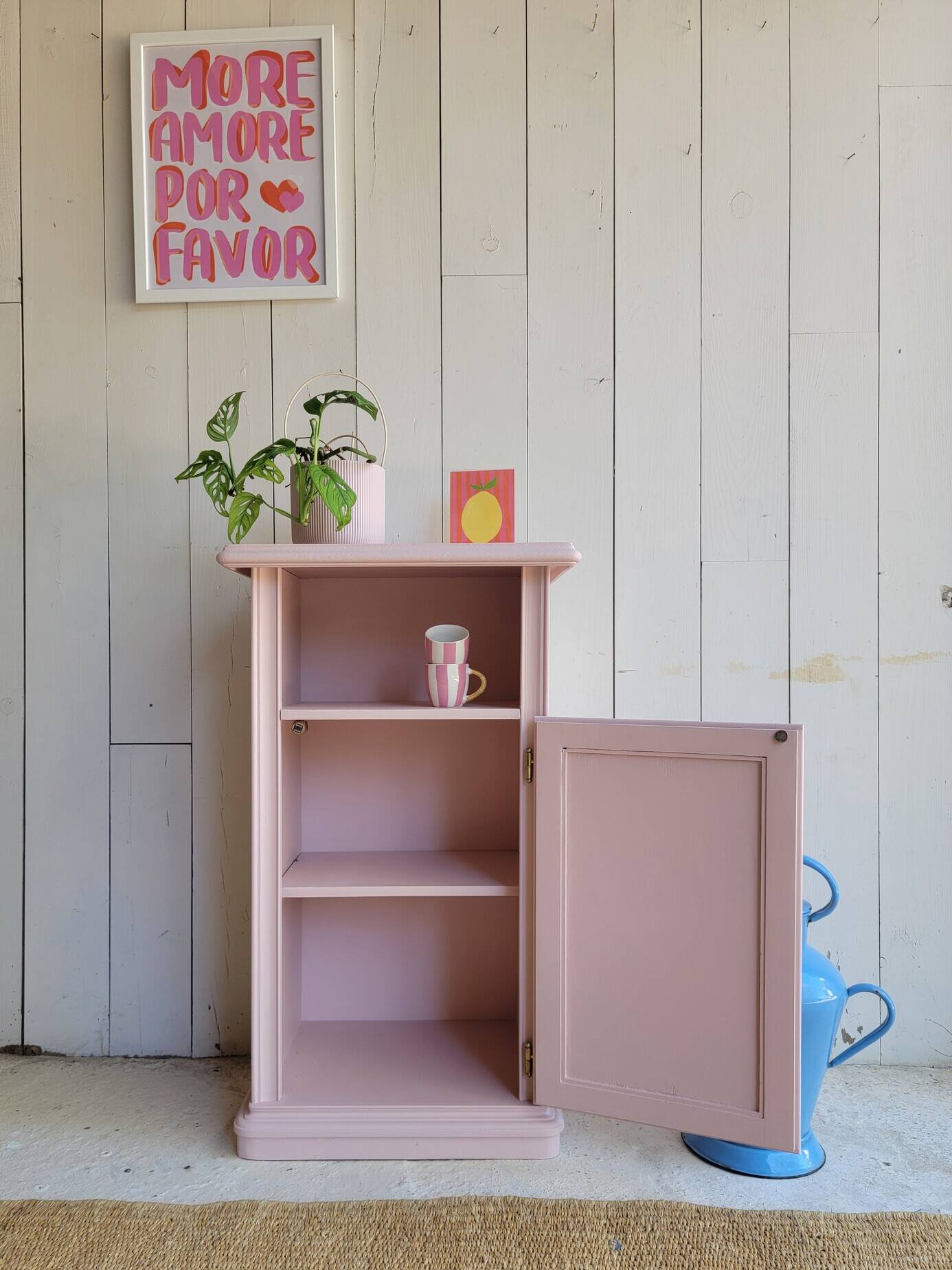 Antique bedside table revamped in pink.