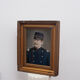 Portrait old man in gold frame