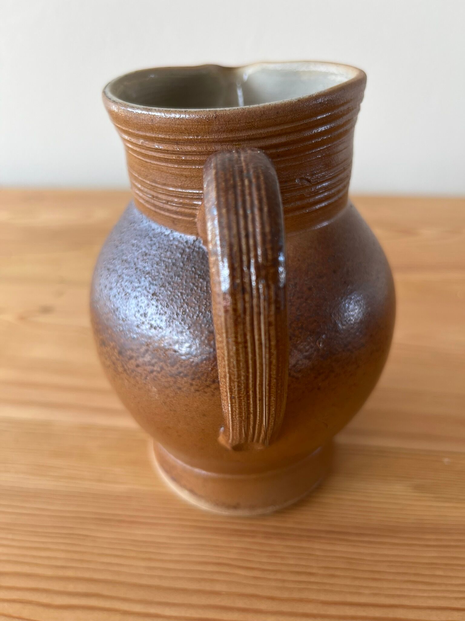 Pitcher in glazed sandstone