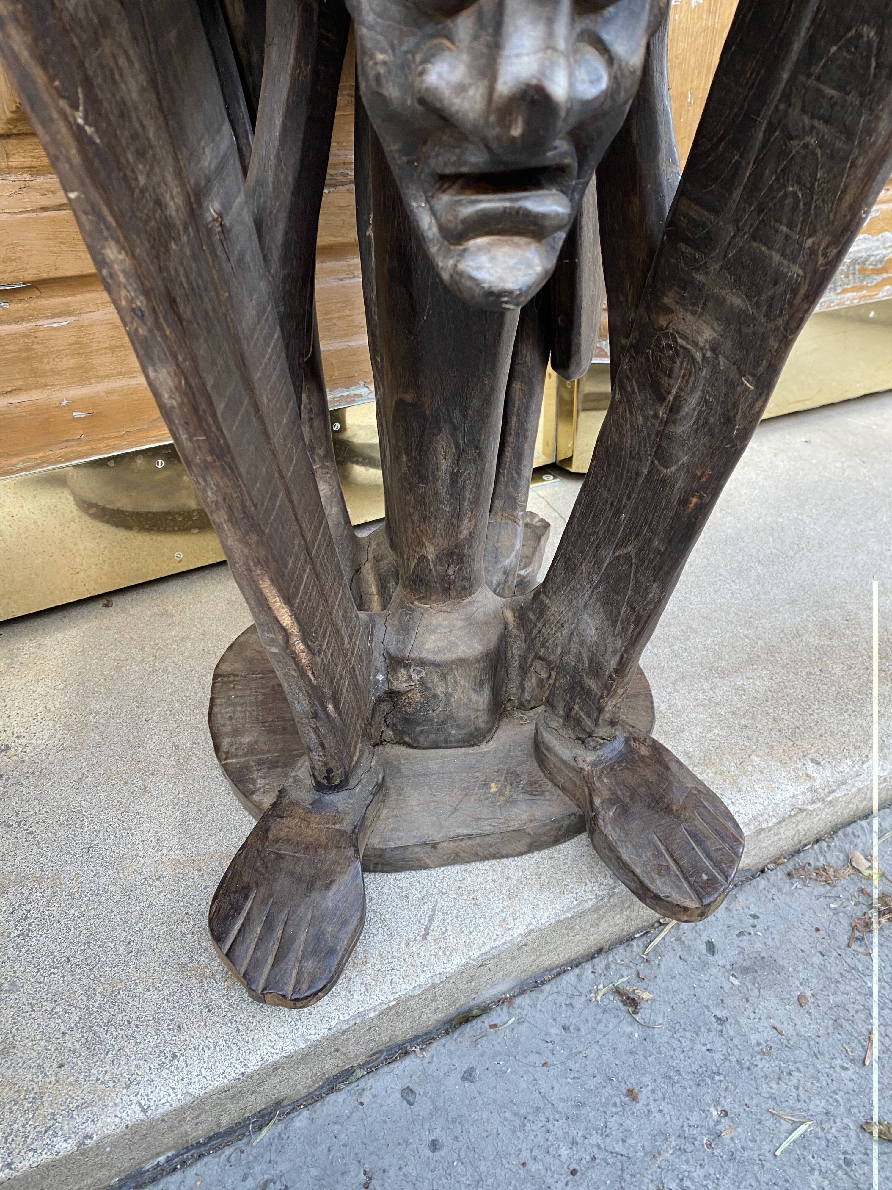 Wooden pedestal table
