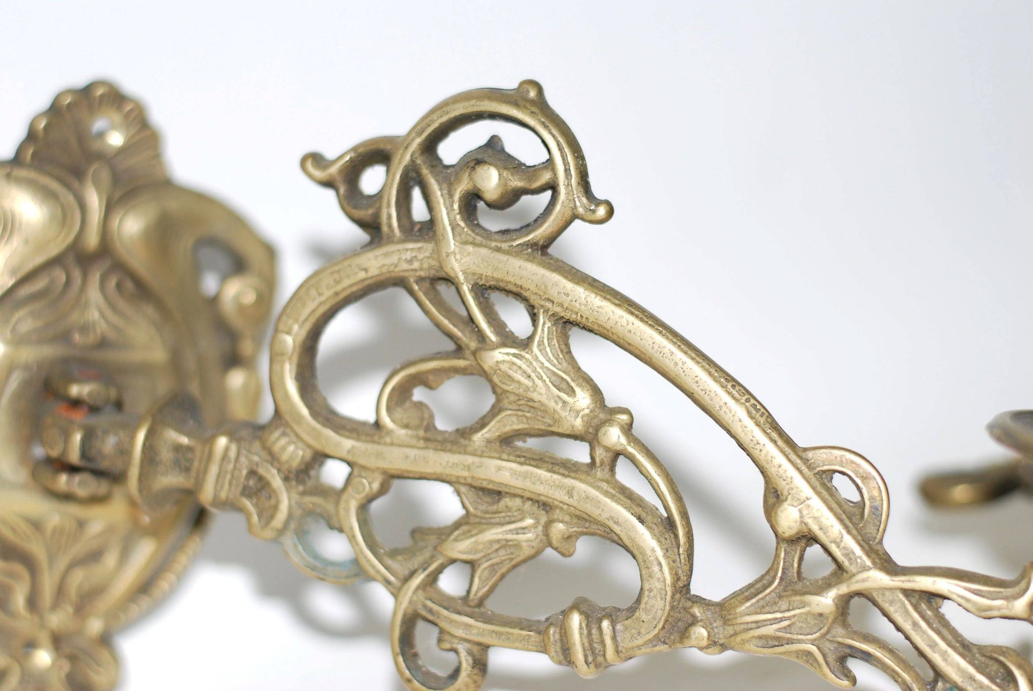 Pair of wall candle holders in brass