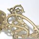 Pair of wall candle holders in brass