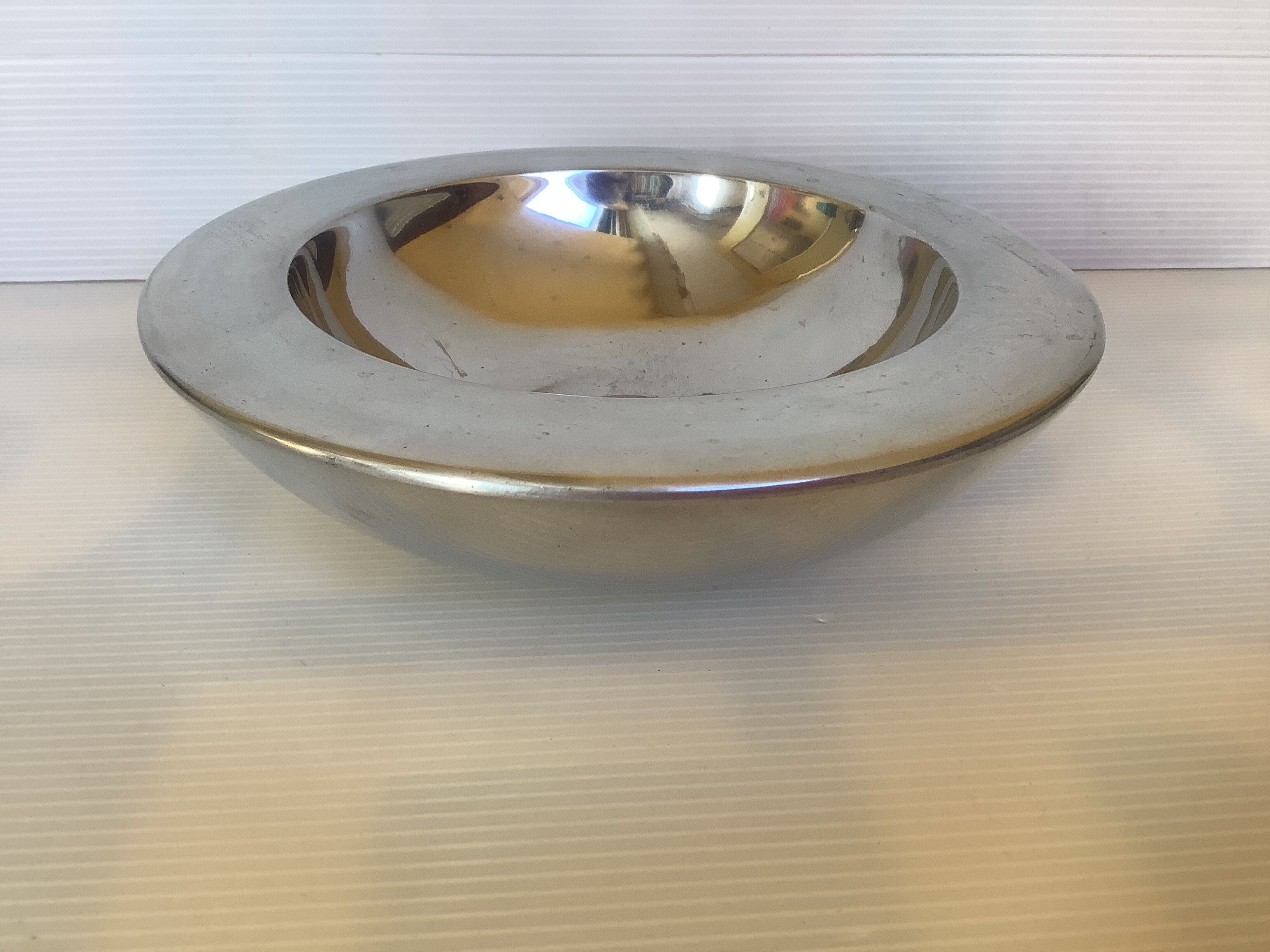Empty chrome metal pocket