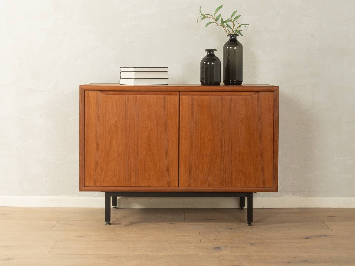 Classic chest of drawers from the 1960s with practical, closed storage space
