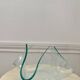 Empty pocket in the shape of a handkerchief in glass