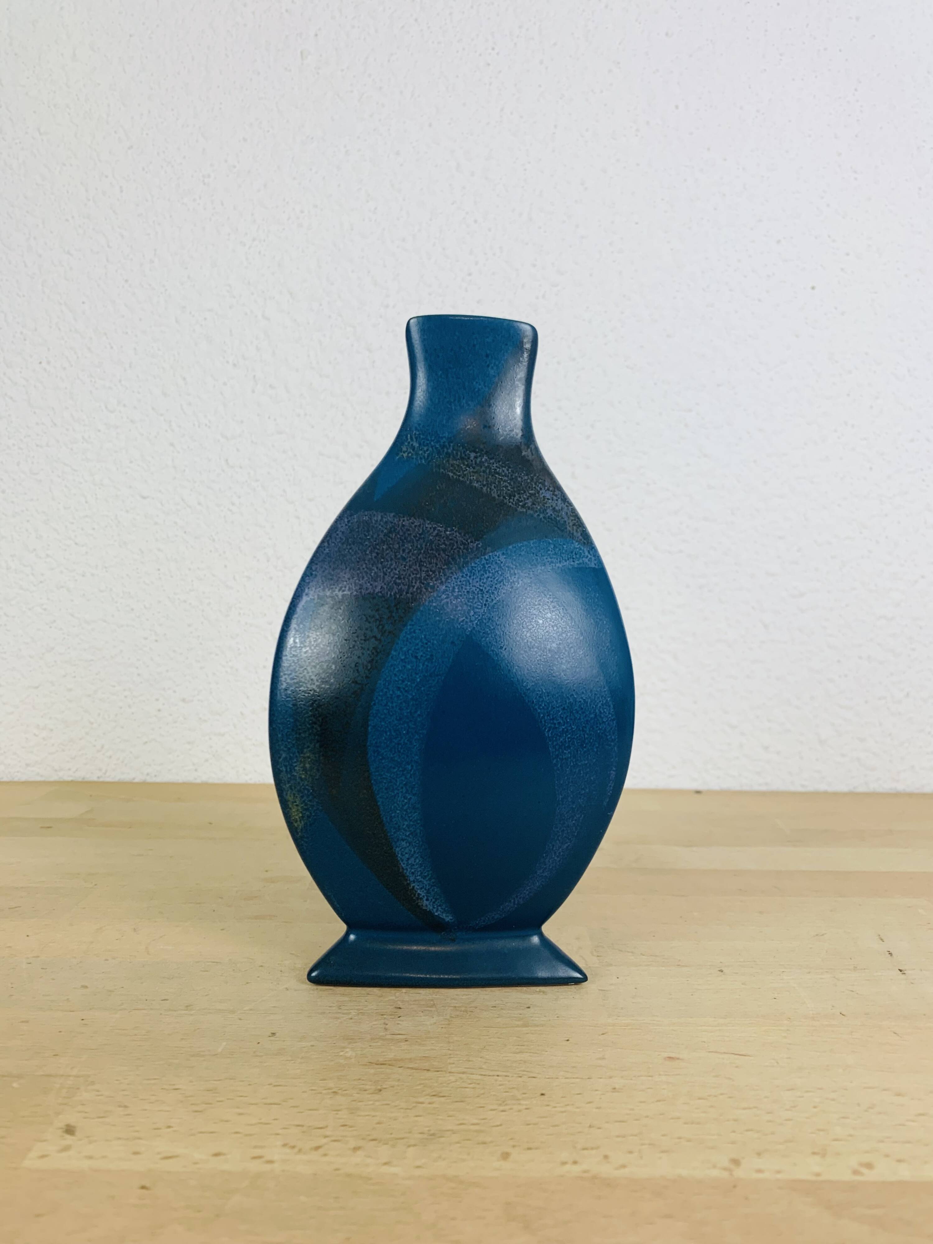 Blue ceramic vase, triangular and pot-bellied