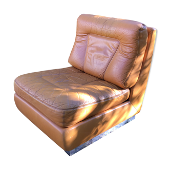 Jacques Charpentier design heater, vintage leather armchair.