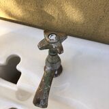 Antique washbasin on ceramic column