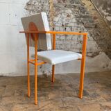 Pair of postmodern orange armchairs and bouclé wool fabric