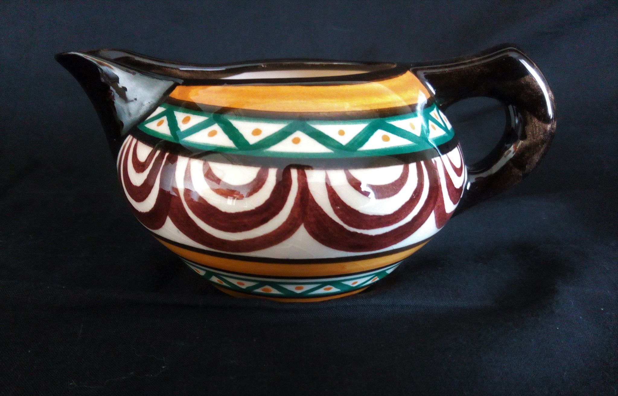 Art deco coffee service in St. Jean de Bretagne earthenware, hand painted (15 pieces)