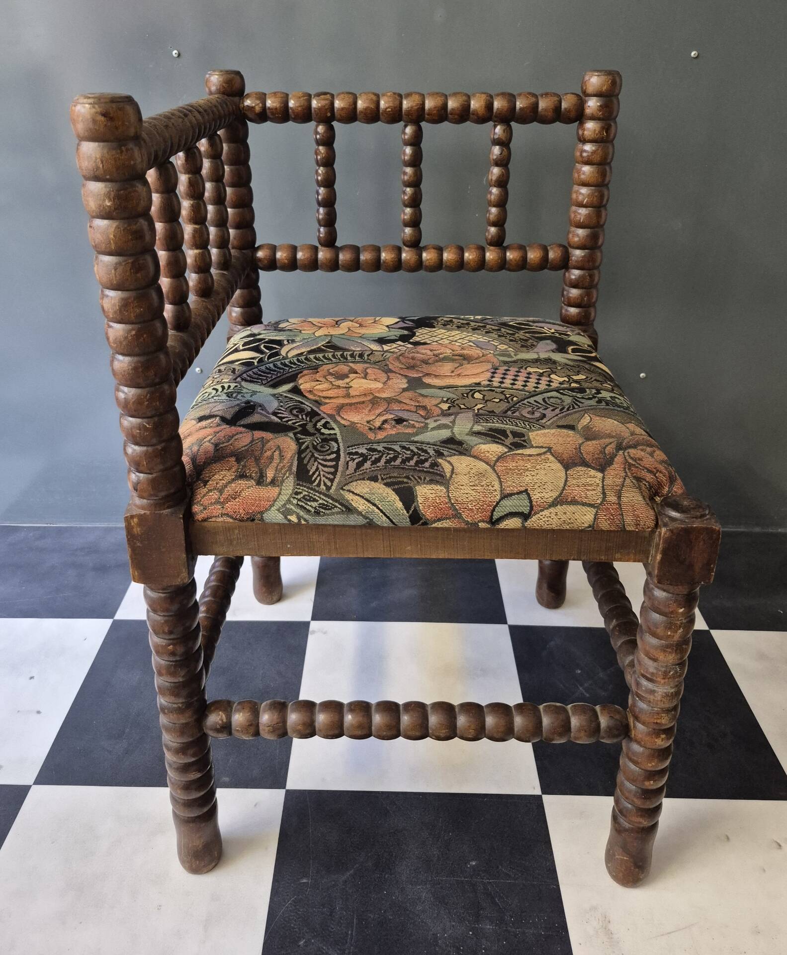 Old pair of corner chairs known as 'fireplace corner' armchairs.