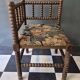 Old pair of corner chairs known as 'fireplace corner' armchairs.