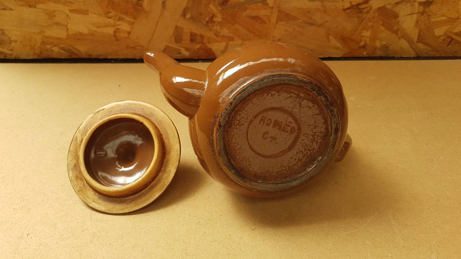 Old vintage brown ceramic romeo teapot